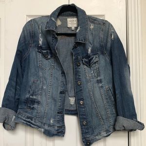 Distressed denim jacket